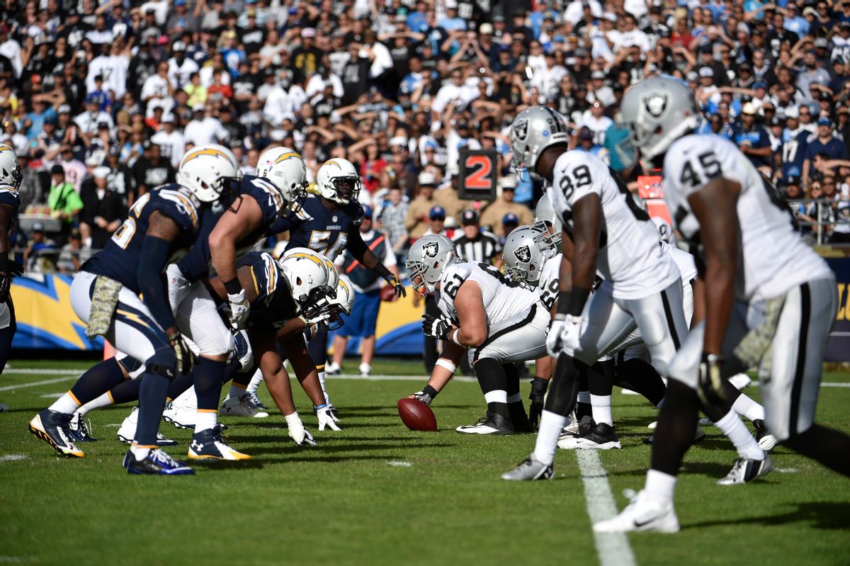 FILE - In this Sunday, Nov. 16, 2014 file photo,The Oakland Raiders and San Diego Chargers face off against each other during the second half of an NFL football game in San Diego. The Oakland Raiders and San Diego Chargers are planning a shared stadium in the Los Angeles area if both teams fail to get new stadium deals in their current hometowns. The teams announced plans for the $1.7 billion stadium in Carson in a joint statement Thursday night, Feb. 19, 2015. (AP Photo/Denis Poroy, File) (AP)