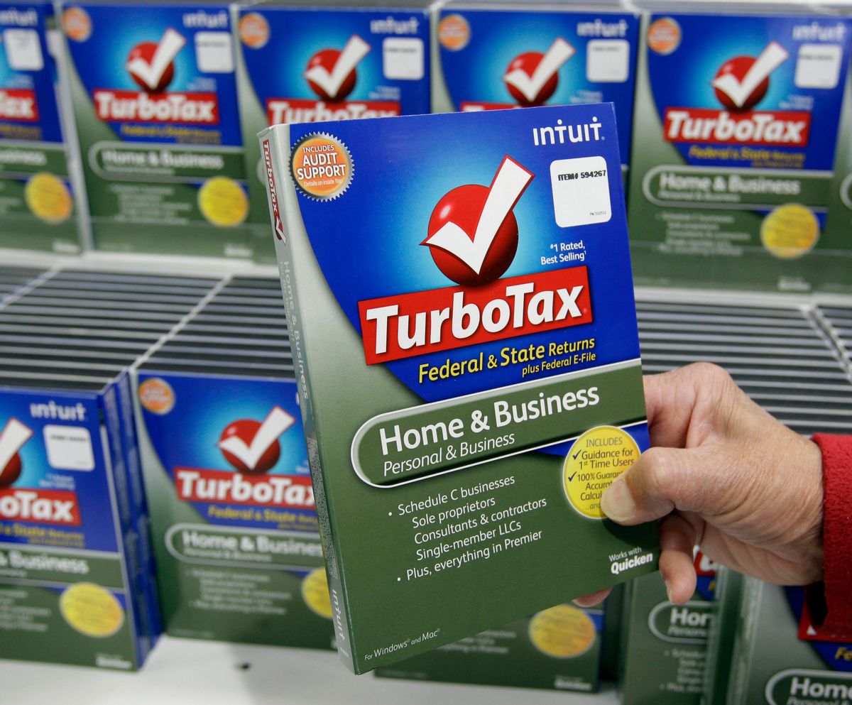 FILE - In this Jan. 24, 2013 file photo, a customer looks at a copy of TurboTax on sale at Costco in Mountain View, Calif. (AP Photo/Paul Sakuma) (AP)