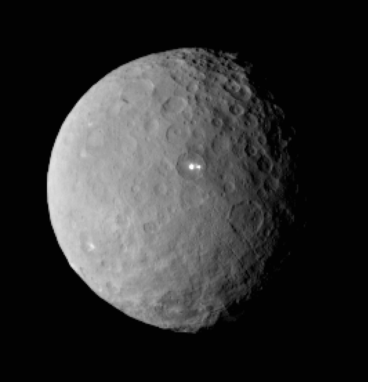 This Feb. 19, 2015 file image provided by NASA shows the dwarf planet Ceres, taken by the space agency's Dawn spacecraft from a distance of nearly 29,000 miles (46,000 kilometers). On Friday, March 6, 2015, NASAs Dawn spacecraft arrives at the mysterious dwarf planet located in the asteroid belt between Mars and Jupiter after a nearly eight-year journey. Dawn, which previously visited Vesta, also in the asteroid belt, has already beamed back images of Ceres as it closes in (AP Photo/NASA/JPL-Caltech/UCLA/MPS/DLR/IDA, File)