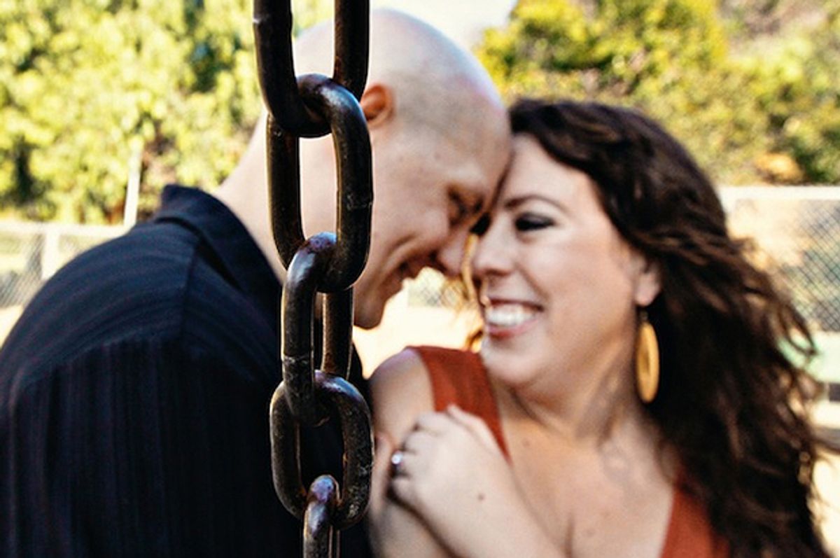 An engagement photo of the author and his fiancee.