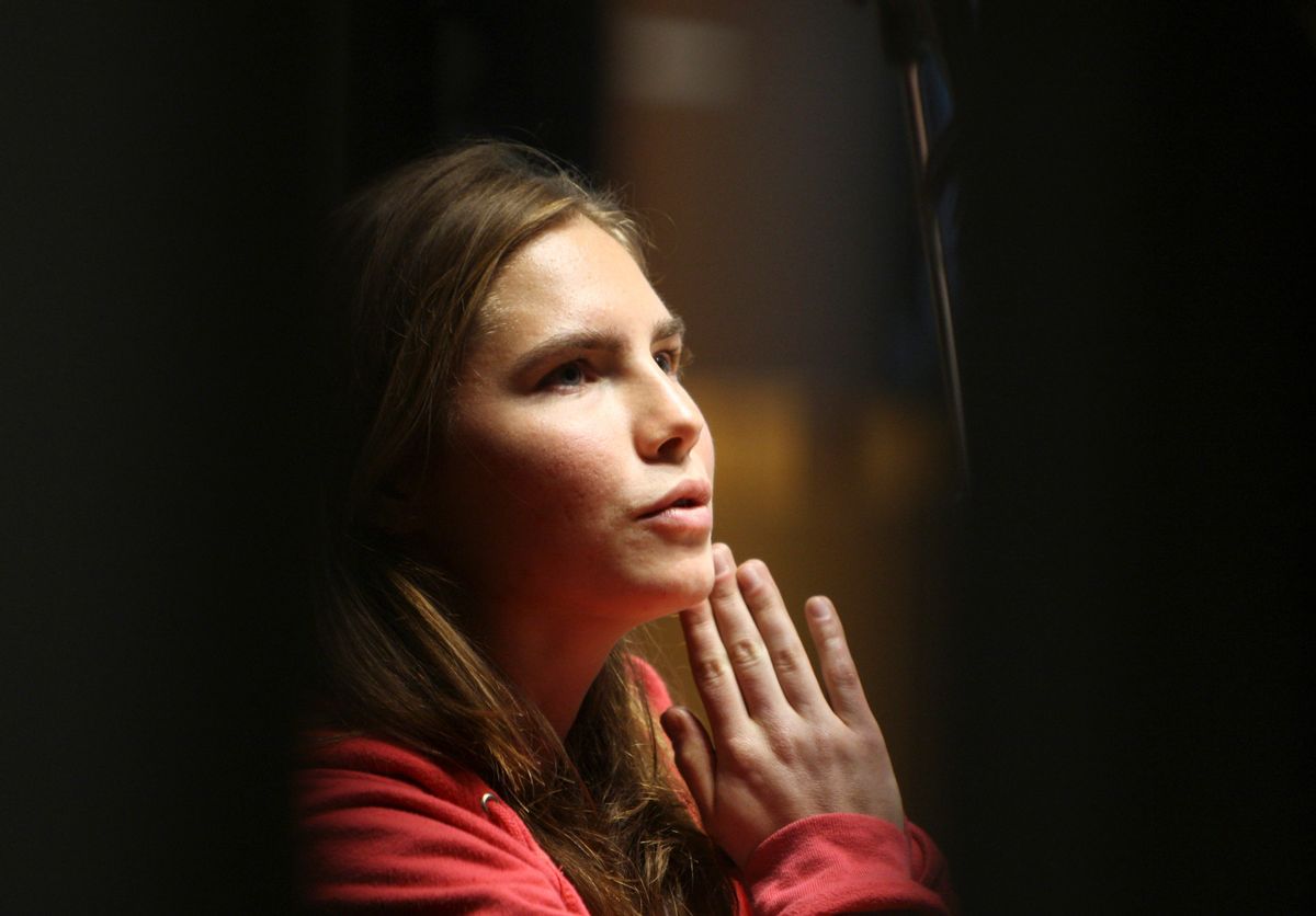 FILE -- In this file photo taken on Nov. 21, 2009, Amanda Knox reacts during a hearing at Perugia's court, Italy. American Amanda Knox and her Italian ex-boyfriend Raffaele Sollecito expect to learn their fate Friday when Italy's highest court hears their appeal of their guilty verdicts in the brutal 2007 murder of Knox's British roommate Meredith Kercher. Several outcomes are possible, including confirmation of the verdicts, a new appeals round, or even a ruling that amounts to an acquittal in the sensational case that has captivated audiences on both sides of the Atlantic.  (AP Photo/Alessandra Tarantino) (AP)