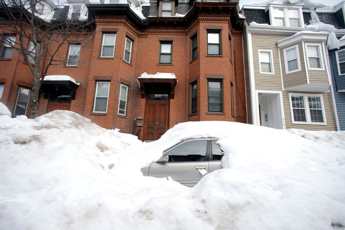 File-In this Feb. 23, 2015 file photo, a car remains buried in snow along a residential street in South Boston. Boston's miserable winter is now also its snowiest season going back to 1872. The official measurement of 108.6 inches at Logan International Airport Sunday night topped a season record of 107.9 inches set in 1995-96. The final 2.9 inches came in a snowstorm that was relatively tame after a record-setting monthly snowfall of 64.9 inches in February. (AP Photo/Elise Amendola, File)  (AP)