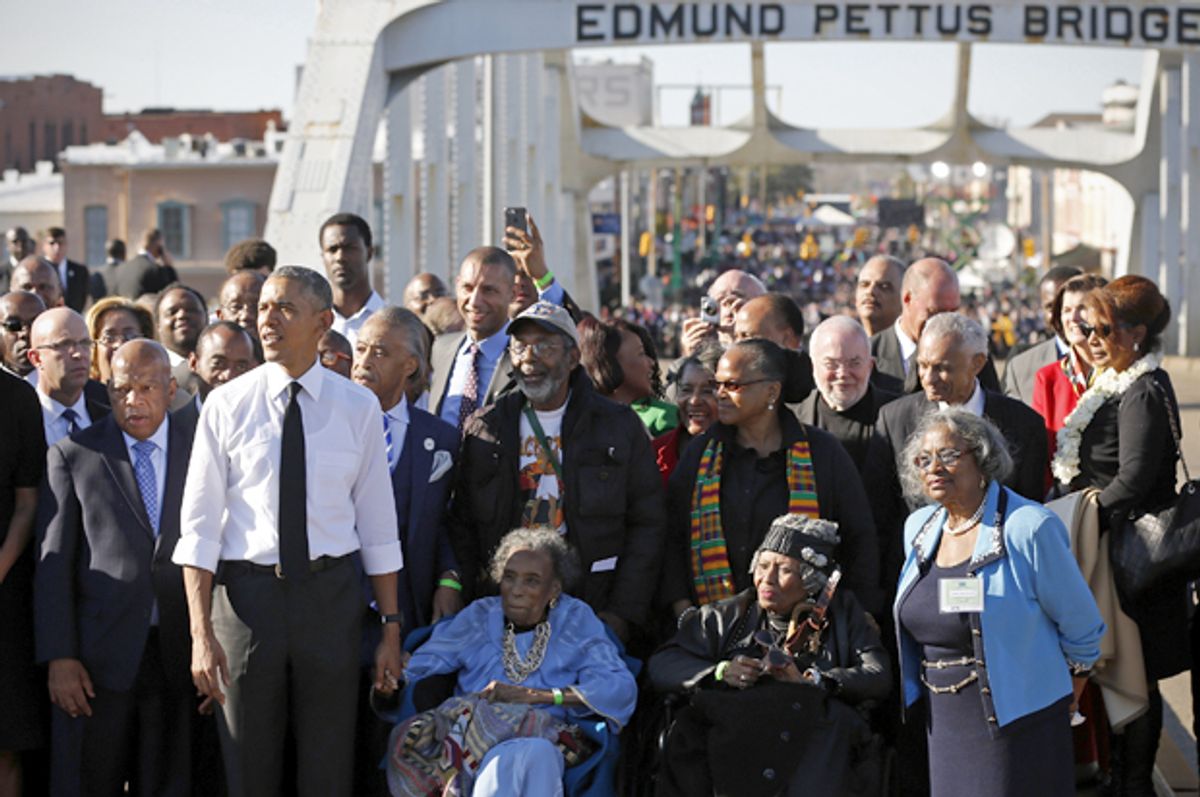 Barack Obama participates in a march across the Edmund Pettus Bridge in Selma, Alabama, March 7, 2015.          (Reuters/Jonathan Ernst)