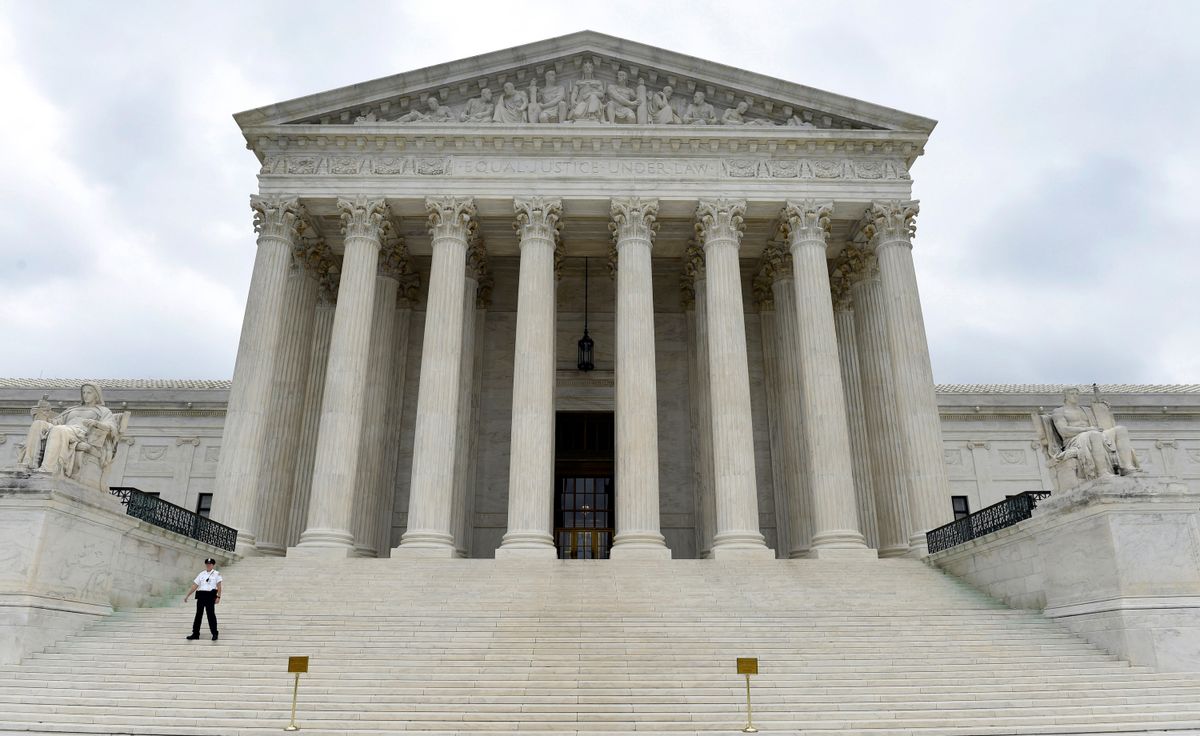 FILE - In this Oct. 3, 2014 file photo, the Supreme Court is seen in Washington. The partisan divide over same-sex marriage among top elected officials remains stark, with Democrats overwhelmingly on record in favor and Republicans mostly silent so far.  (AP Photo/Susan Walsh, File)   (AP)