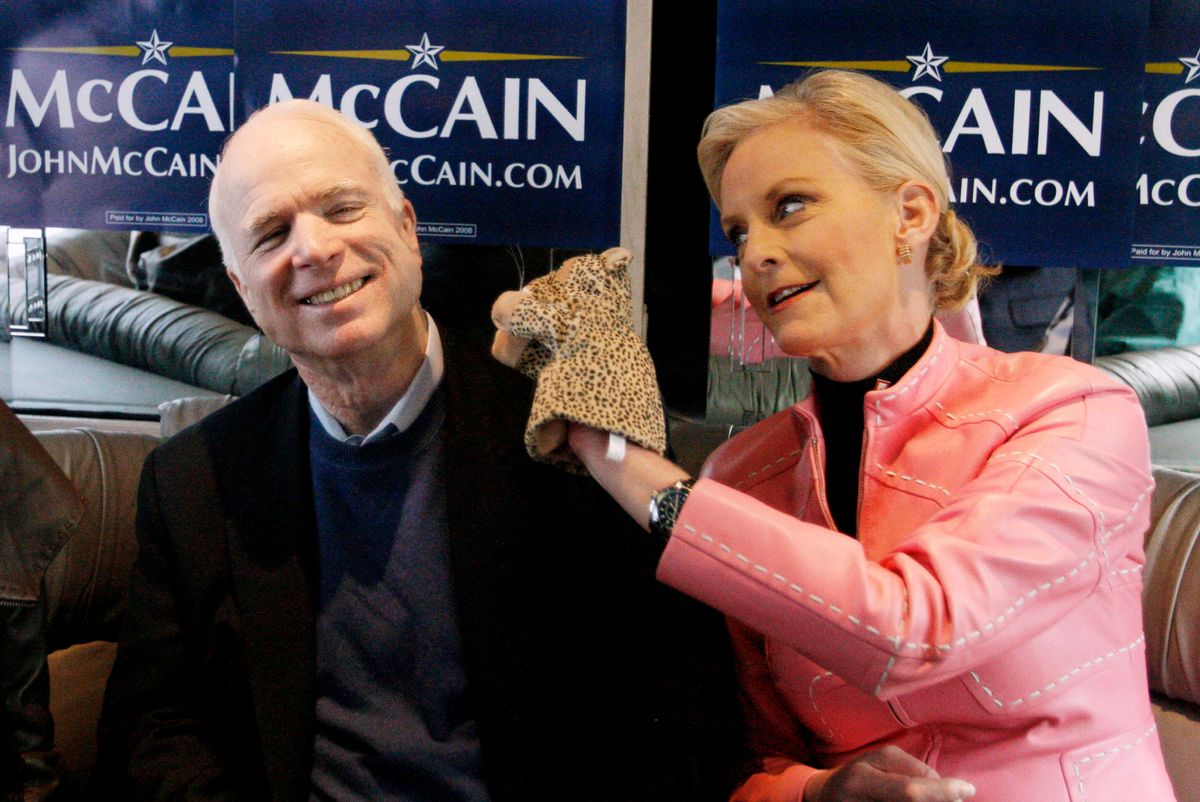 FILE - In this Jan. 19, 2008 file photo, Cindy McCain, wife of Republican presidential hopeful Sen. John McCain, R-Ariz., uses a cheetah hand puppet to make her husband laugh as they ride the "Straight Talk Express" campaign bus to a polling station on the day of South Carolina's Republican presidential primary in Charleston, S.C. "A campaign is like the world's longest job interview, and even though most of us like to think that we're being our natural selves when we interview for a new job, it's only human nature to self-edit ourselves and try to make the best possible impression," says Schnur, director of the University of Southern Californias political institute. (AP Photo/Charles Dharapak, File)  (AP)