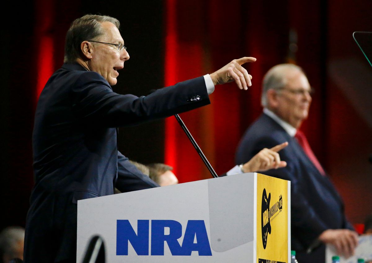 Wayne LaPierre, left, executive vice president of the National Rifle Association, speaks during the annual meeting of members at the NRA convention Saturday, April 11, 2015, in Nashville, Tenn. At right is Jim Porter, NRA president. (AP Photo/Mark Humphrey) (AP)