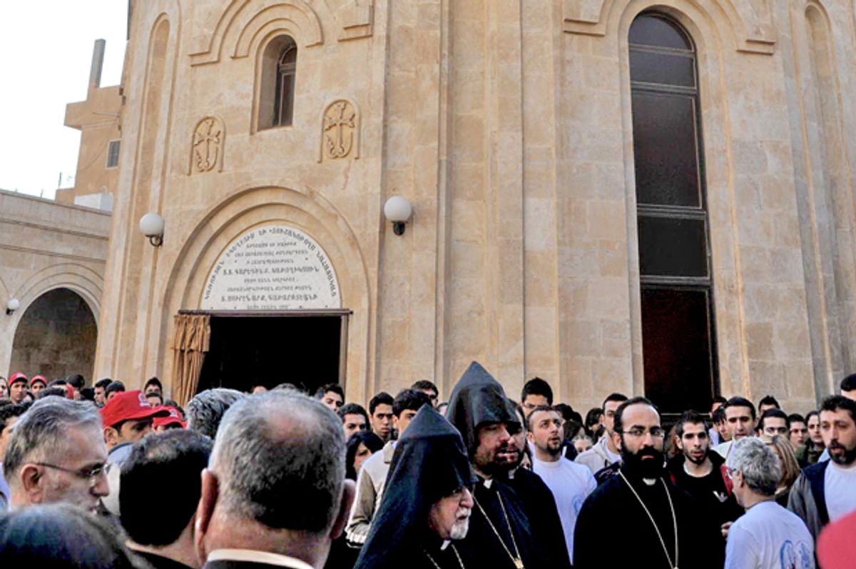 People gather at the Holy Martyrs Armenian Church in Deir Zor, Syria, in 2009, five years before it was destroyed in a bombing.       (flickr/Studio Ashnag)