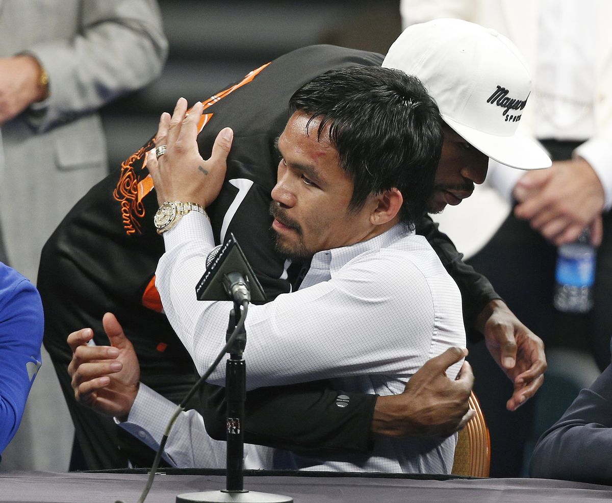 Manny Pacquiao, Floyd Mayweather Jr. (Credit: AP Photo/John Locher) (AP)