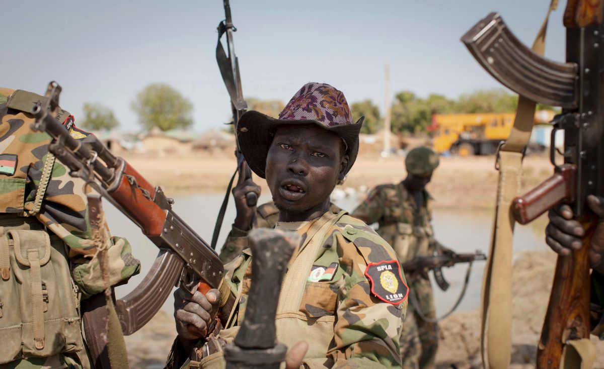 A South Sudanese government soldier chants in celebration   (AP/Mackenzie Knowles-Coursin)