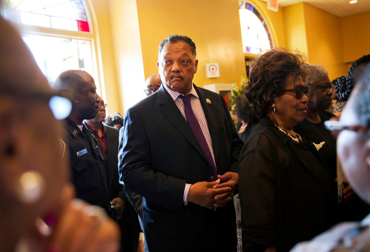 The Rev. Jesse Jackson arrives for the funeral service for Ethel Lance, 70, one of the nine people killed in the shooting at Emanuel AME Church. (AP Photo/David Goldman)