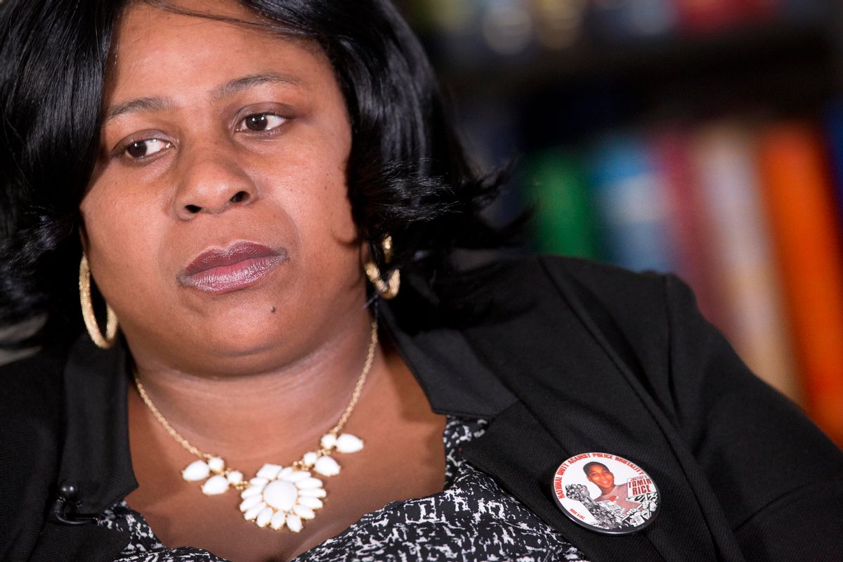 FILE - In this Dec. 15, 2014 file photo, Samaria Rice, of Cleveland, Ohio, wears a button with her son, Tamir Rice,  photograph during an interview at The Associated Press, Monday, Dec. 15, 2014 in New York.  Police say the investigation into the death of Rice, a 12-year-old boy fatally shot by a Cleveland policeman while he held a pellet gun has been turned over to county prosecutors. The Cuyahoga County sheriff's department said Wednesday, June 3, 2015,  its investigation into the shooting of Tamir Rice is complete. The county prosecutor has said the case will be presented to a grand jury that will determine if criminal charges are filed. (AP Photo/Mark Lennihan) (AP)