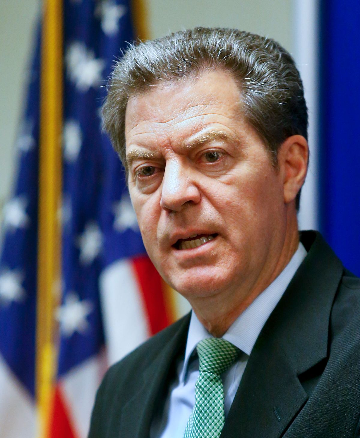 Kansas Gov. Sam Brownback addresses the media about the legislative session during a press conference on Tuesday June 16, 2015, at the Kansas Statehouse in Topeka, Kan.  (Chris Neal/The Topeka Capital-Journal via AP) (AP)