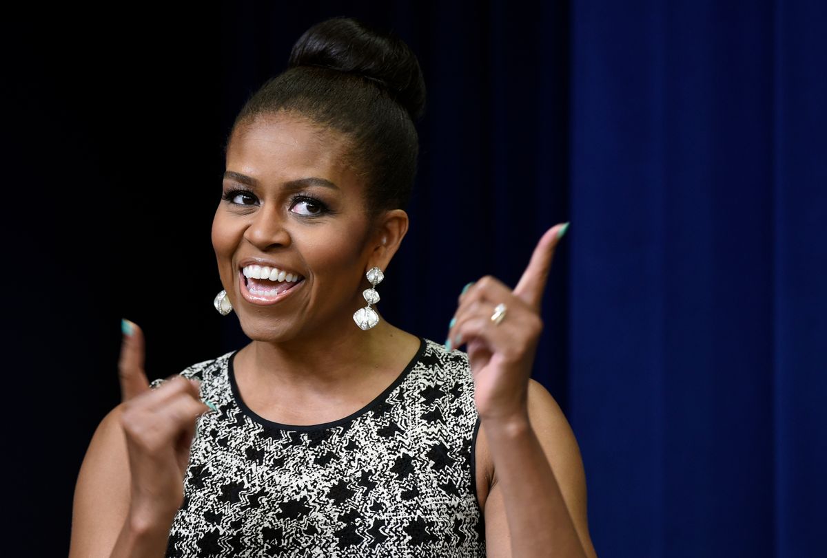 First lady Michelle Obama speaks to a student in the audience at the Celebrating Innovations in Career and Technical Education (CTE) event in the South Court Auditorium in the White House complex in Washington, Tuesday, June 30, 2015. Obama recognized students and educators for their work connecting the classroom to real-life career opportunities. (AP Photo/Susan Walsh) (AP)