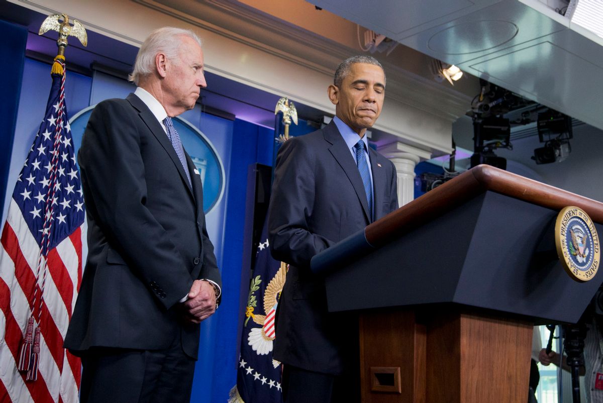 President Barack Obama, accompanied by Vice President Joe Biden, pauses while speaking in the Brady Press Briefing Room of the White House in Washington, Thursday, June 18, 2015, on the church shooting in Charleston, S.C., prior to his departure to Los Angeles.  (AP/Manuel Balce Ceneta)