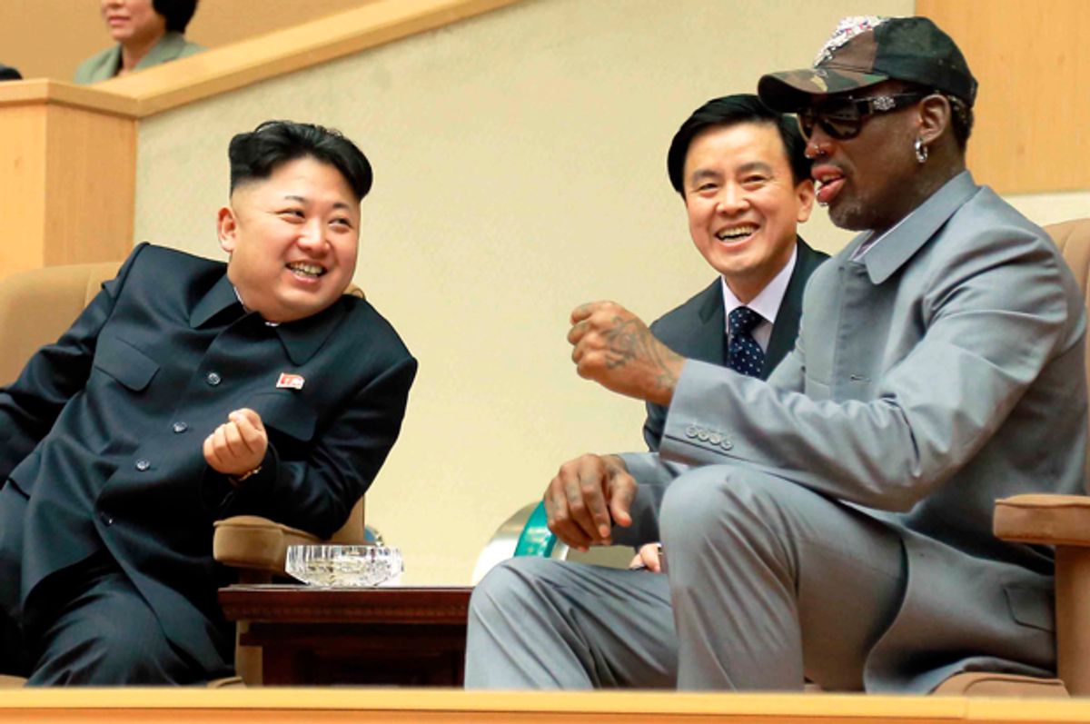 Kim Jong-un watches a basketball game with Dennis Rodman at Pyongyang Indoor Stadium in this undated photo released by Korean Central News Agency, Jan. 9, 2014.       (Reuters/KCNA)