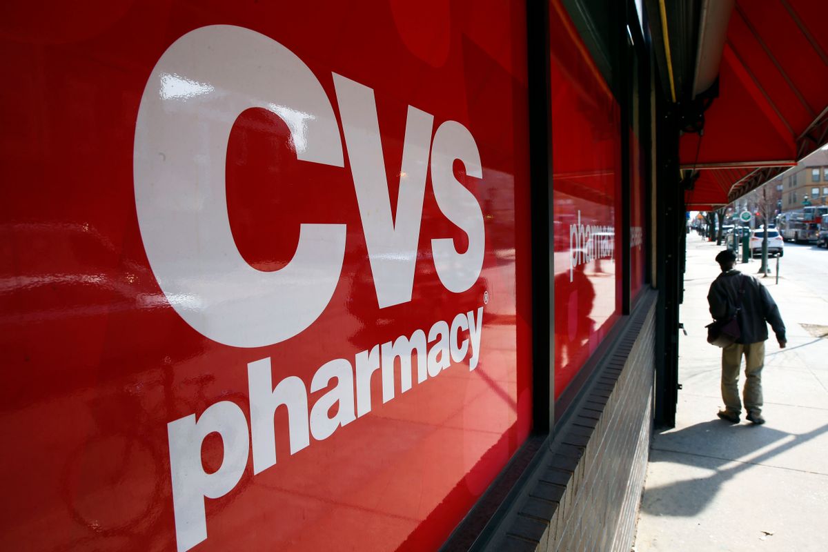 FILE - This March 25, 2014, file photo, shows a CVS store in Philadelphia. Target announced Monday, June 15, 2015, that it is selling its pharmacy and clinic businesses to drugstore chain CVS Health for about $1.9 billion in a deal that combines the resources of two retailers seeking to polish their reputations as health care providers. (AP Photo/Matt Rourke, File) (AP)