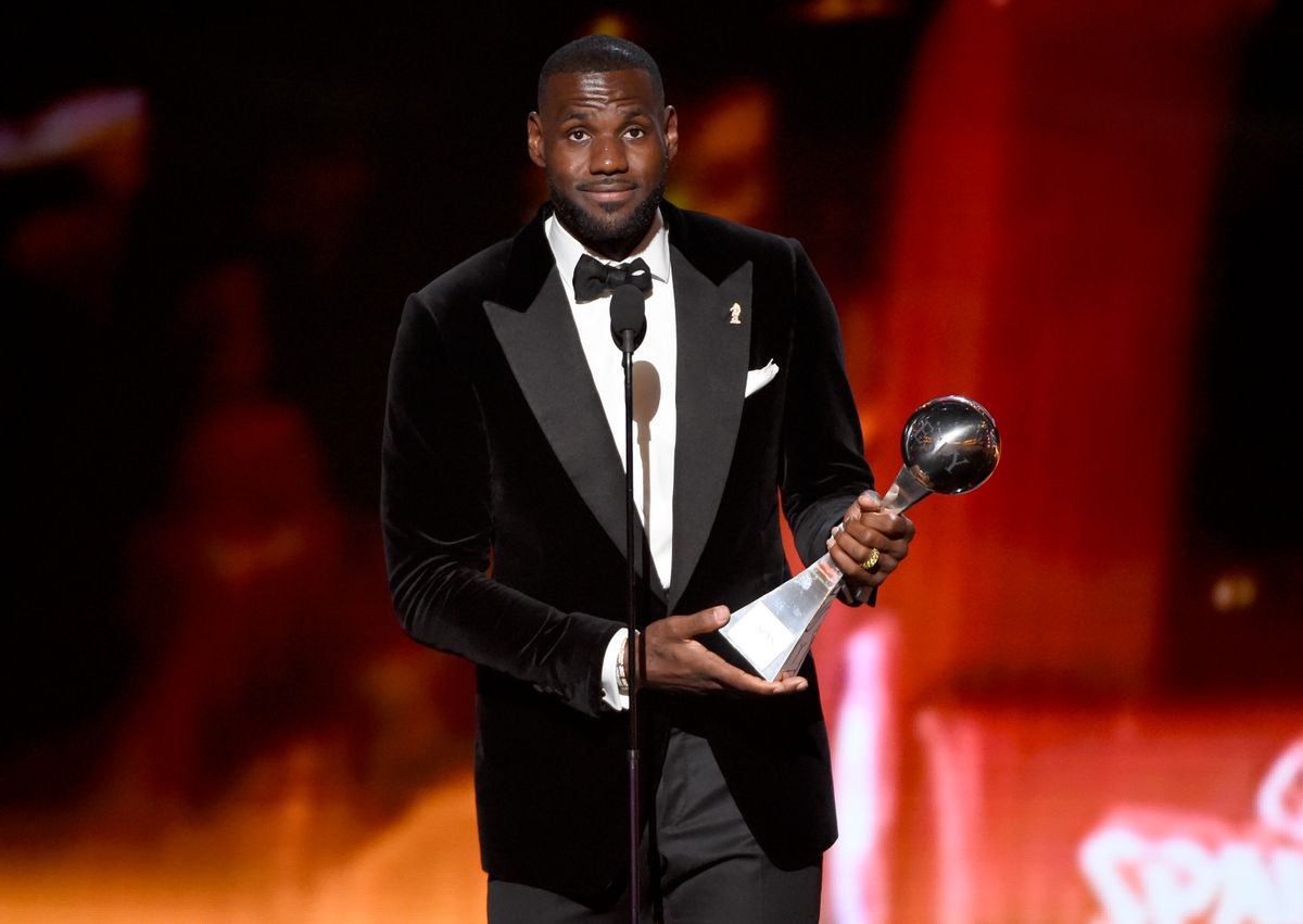 FILE - In this Wed., July 15, 2015 file photo, NBA player LeBron James, of the Cleveland Cavaliers, accepts the award for best championship performance at the ESPY Awards at the Microsoft Theater, in Los Angeles. The NBA star and his company, SpringHill Entertainment, have signed a content creation deal with Warner Bros. that includes potential projects in film, television and other digital properties. Warner Bros. Chairman and CEO Kevin Tsujihara announced the partnership Wednesday, July 22, 2015. (Photo by Chris Pizzello/Invision/AP, File) (Chris Pizzello/invision/ap)