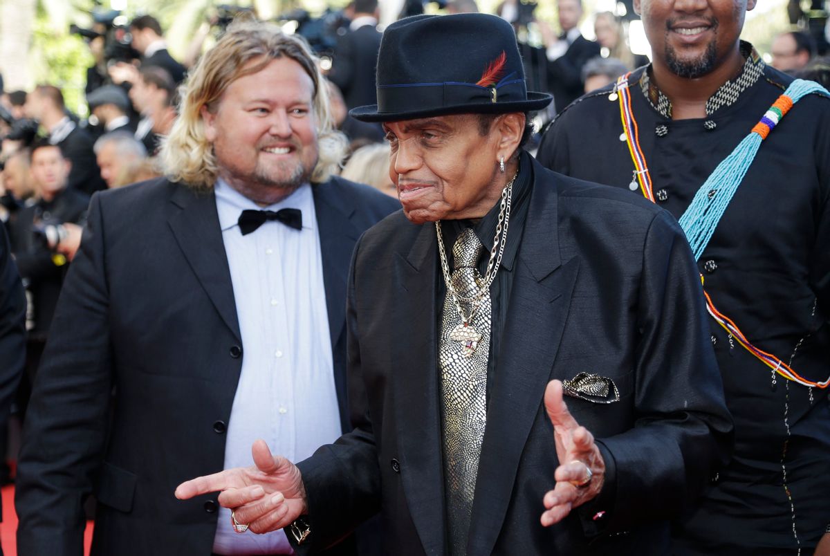FILE  - In this Friday, May 23, 2014 file photo, Joe Jackson arrives for the screening of Sils Maria at the 67th international film festival, Cannes, southern France. A Brazilian hospital says Joe Jackson  the father of the late Michael Jackson and the patriarch of the musical family  suffered a stroke while visiting the South American nation. An emailed statement early Monday, July 27, 2015 from the Albert Einstein hospital in Sao Paulo says only that Jackson was admitted to the hospital Sunday afternoon. He is in the intensive care unit. (AP Photo/Thibault Camus, file) (AP)