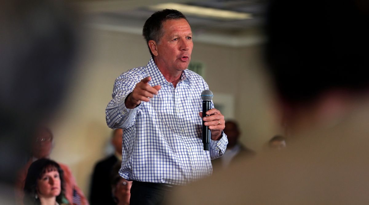 Republican presidential candidate Ohio Gov. John Kasich addresses a gathering at a town hall style meeting during a campaign stop in Greenland, N.H., Wednesday, July 22, 2015. (AP Photo/Charles Krupa) (AP)
