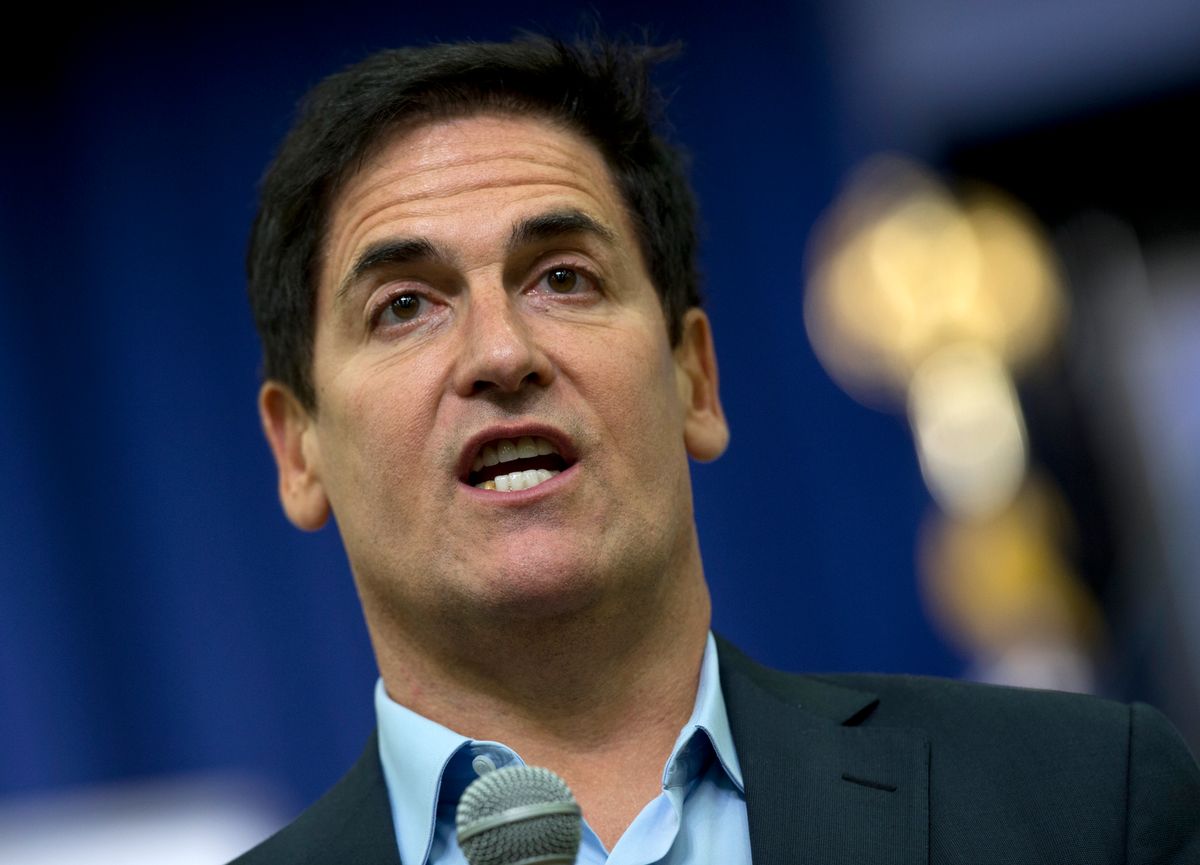FILE - In this May 11, 2015, file photo, Dallas Mavericks basketball team owner Mark Cuban answers questions from the audience before President Barack Obama spoke in the South Court Auditorium of the Eisenhower Executive Office Building on the White House complex in Washington. The NBA has fined Mark Cuban for commenting about the team's agreements with DeAndre Jordan and Wes Matthews during the league's free agent moratorium. NBA spokesman Tim Frank confirmed the penalty, which ESPN.com reported Tuesday, July 7, 2015,  was for $25,000. (AP Photo/Carolyn Kaster), File (AP)