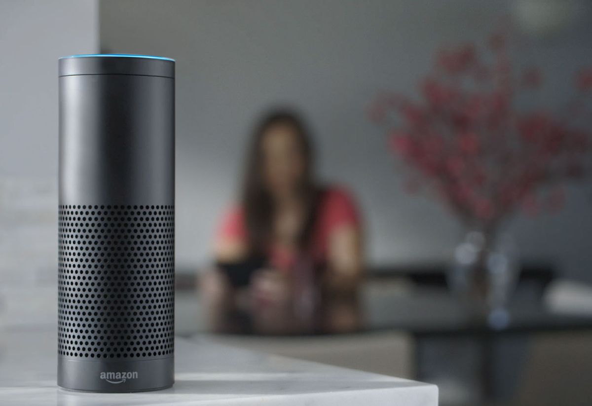 FILE - This file product image provided by Amazon shows the Amazon Echo, the latest advance in voice-recognition technology thats enabling machines to record snippets of conversation that are analyzed and stored by companies promising to make their customers lives better. But the Internet-connected microphones and cameras on the devices are also raising the specter of them being used by corporations or hackers to snoop on private conversations. (Amazon via AP, File) (AP)