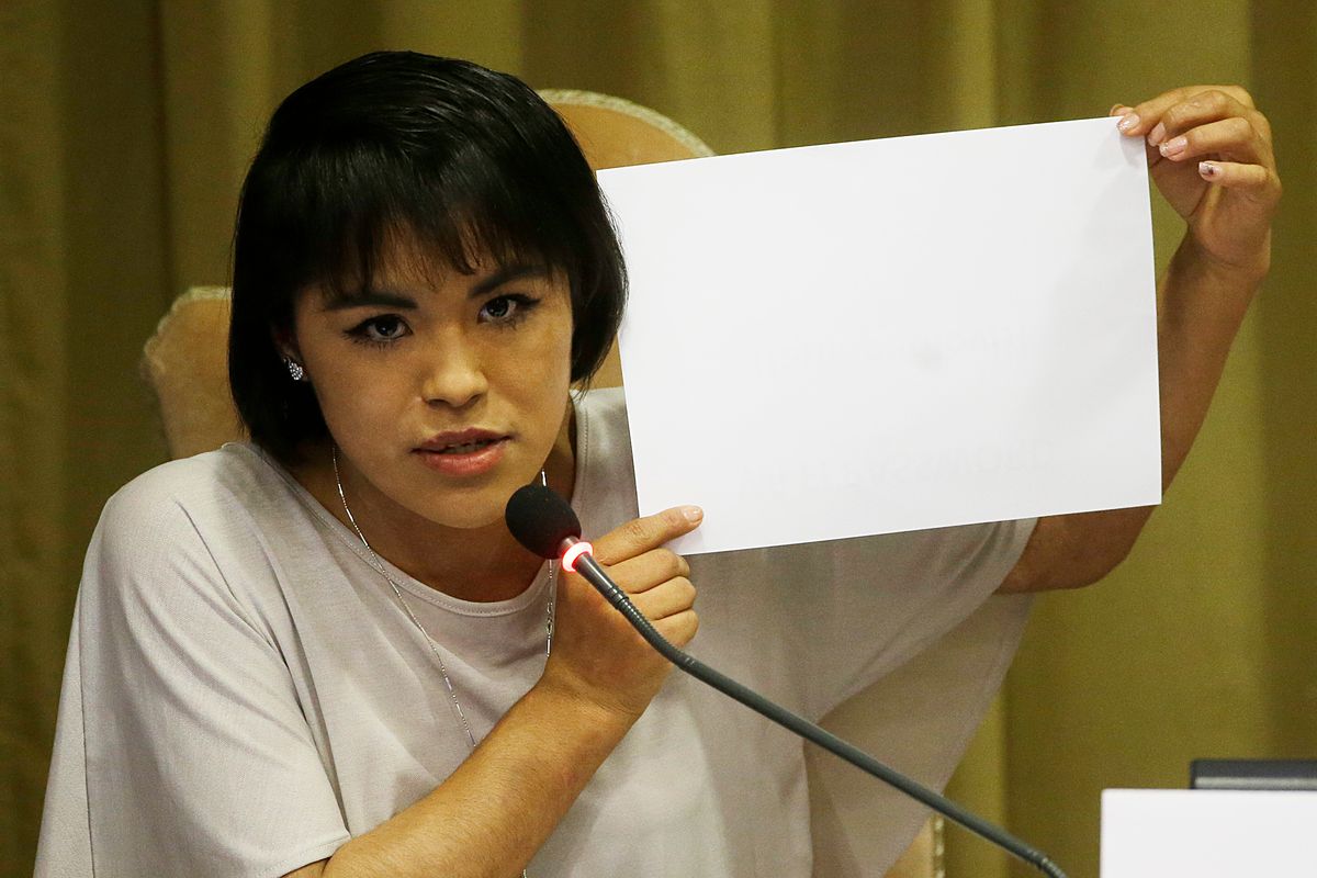 Victim of forced labor Anna Laura Perez Jaimes shows a white paper as she delivers her speech in the Synod Hall to attend a conference on Modern Slavery and Climate Change at the Vatican, Tuesday, July 21, 2015. Dozens of environmentally friendly mayors from around the world are meeting at the Vatican this week to bask in the star power of eco-Pope Francis and commit to reducing global warming and helping the urban poor deal with its effects. (AP Photo/Gregorio Borgia) (AP)
