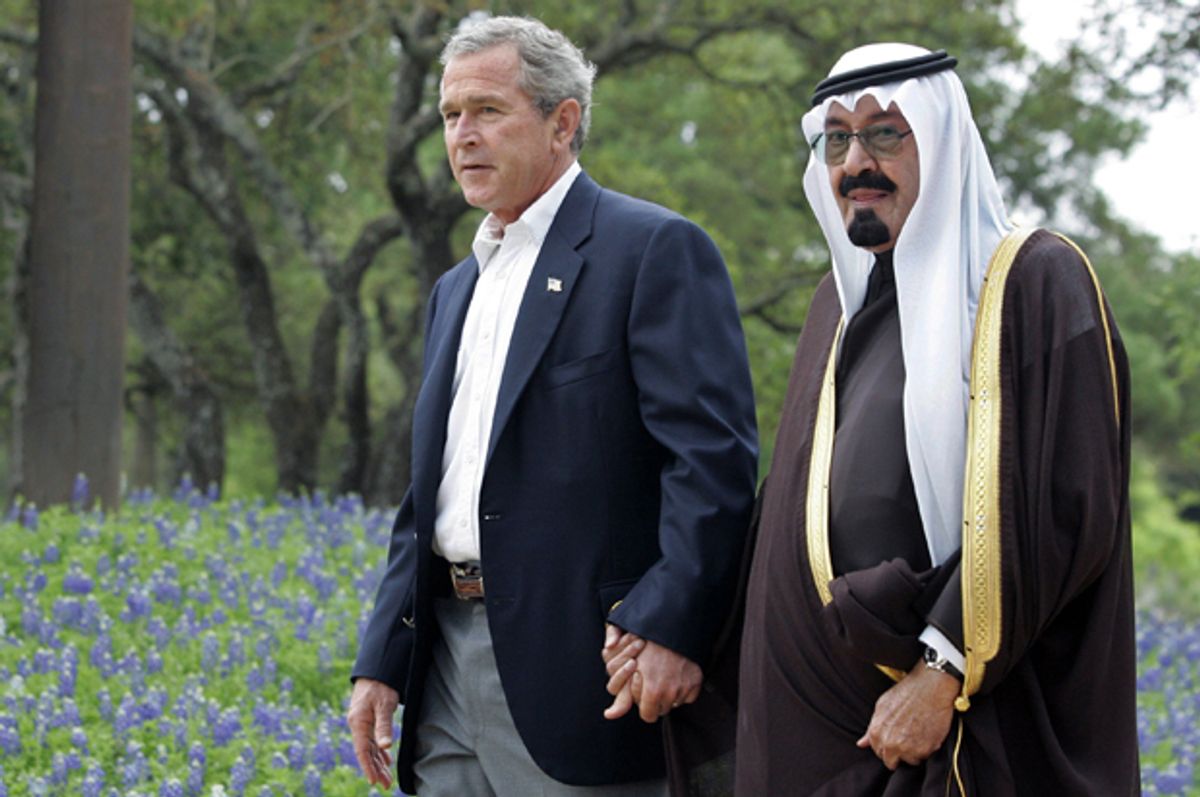 Former President Bush holding hands with the late Saudi King Abdullah, during a visit to Bush's Texas ranch in 2005.   (Reuters/Jason Reed)
