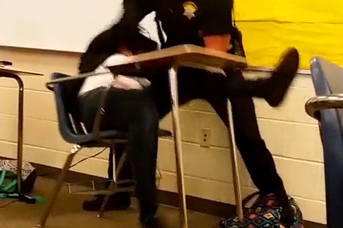 A still from a video of a school police officer in Columbia, South Carolina, Oct. 2015