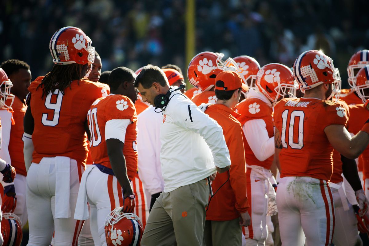 Clemson head coach Dabo Swinney walks away from a huddle in the fourth quarter of an NCAA college football game against Georgia Tech, Saturday, Nov. 15, 2014, in Atlanta. Georgia Tech won 28-6. (AP Photo/David Goldman) (AP)