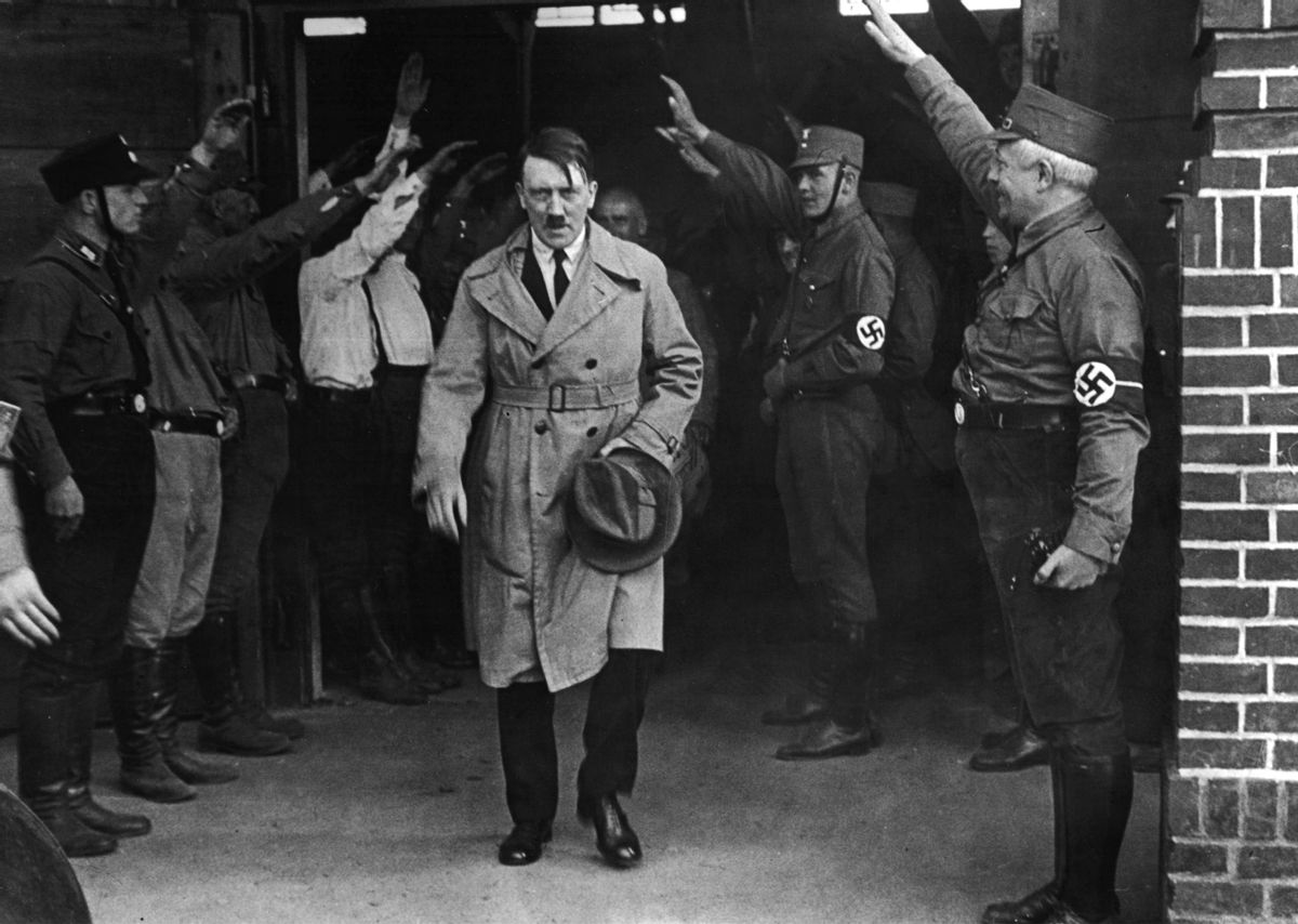 FILE - In this Dec. 5, 2013 file photo Adolf Hitler, leader of the National Socialists, emerges from the party's Munich headquarters. Historical documents show Adolf Hitler enjoyed special treatment, including plentiful supplies of beer, during his time in Landsberg prison.  (AP Photo/file) (AP)