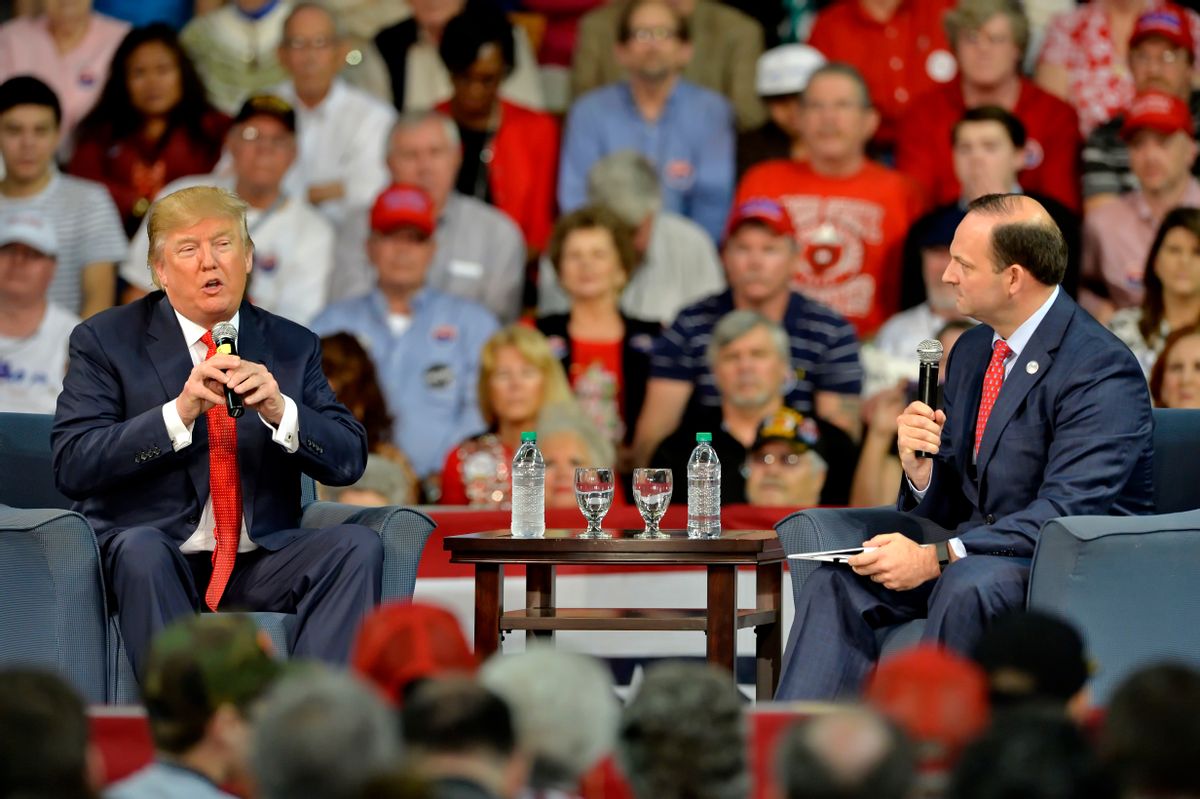 Republican presidential candidate Donald Trump answers questions from South Carolina Attorney General Alan Wilson, right, at a town hall meeting in the Convocation Center on the University of South Carolina Aiken campus Saturday, Dec. 12, 2015, in Aiken, S.C. (AP Photo/Richard Shiro) (AP)