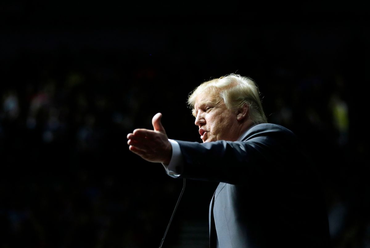 Republican presidential candidate, businessman Donald Trump addresses supporters at a campaign rally, Monday, Dec. 21, 2015, in Grand Rapids, Mich. (AP Photo/Carlos Osorio) (AP)