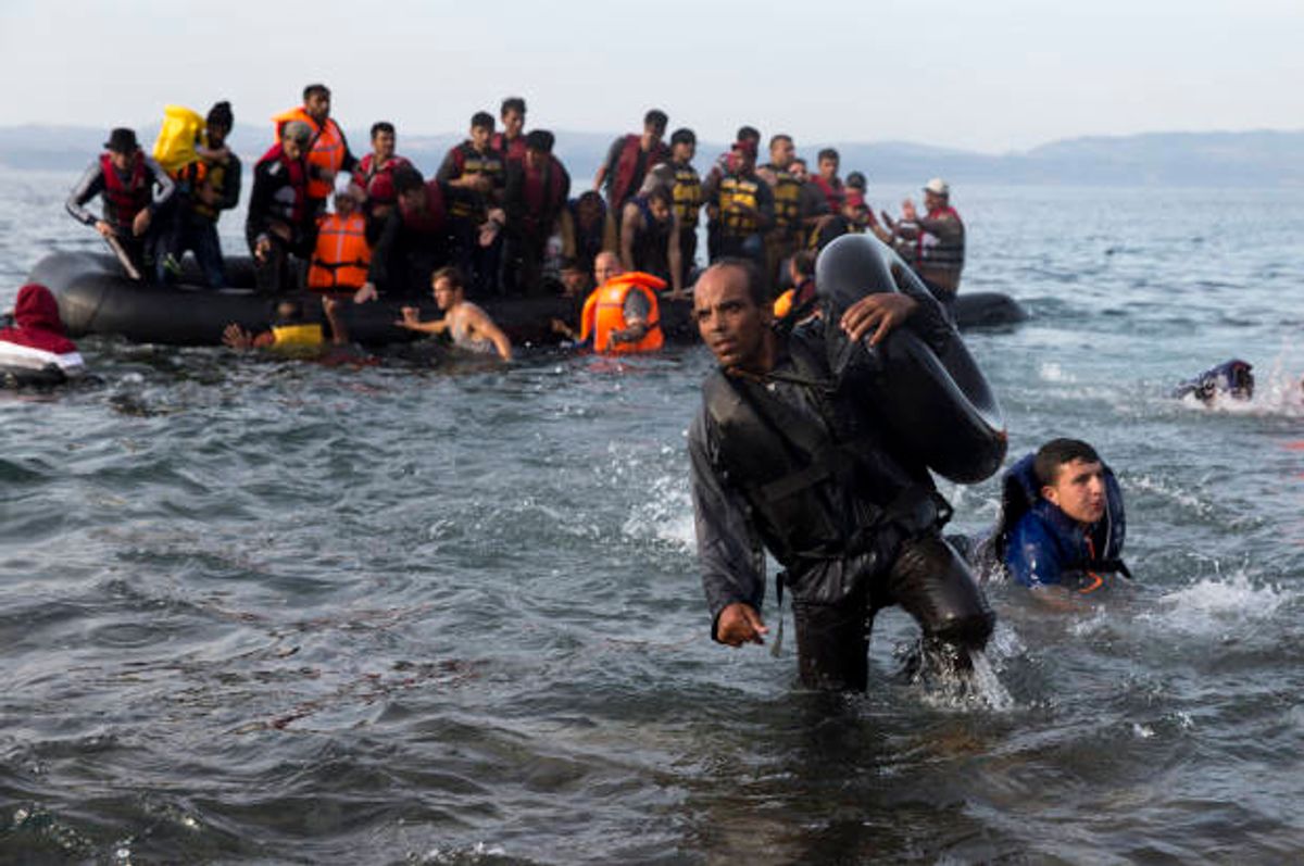 Refugees arrive after crossing from Turkey to Lesbos island, Greece in September 2015  (AP/Petros Giannakouris)