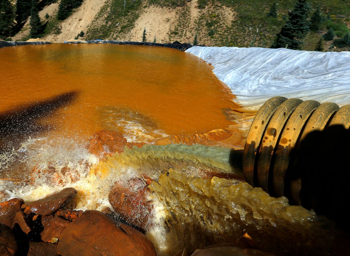 FILE - In this Aug. 14, 2015, file photo, water flows through a series of sediment retention ponds built to reduce heavy metal and chemical contaminants from the Gold King Mine wastewater accident, in the spillway downstream from the mine, outside Silverton, Colo.  (AP Photo/Brennan Linsley, File) (AP)