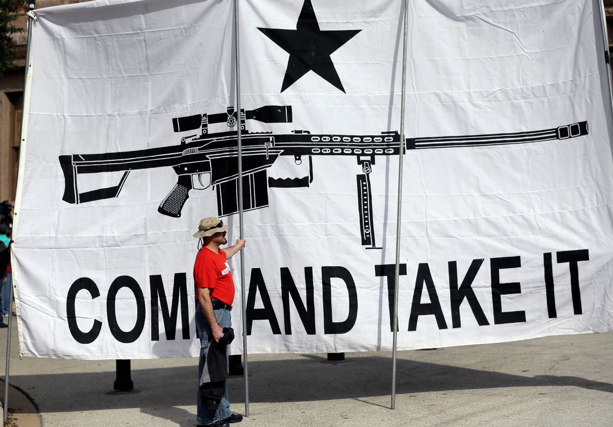 A "Come and Take It" banner at a rally in support of open carry gun laws at the Capitol, in Austin, Texas in 2015 (AP Photo/Eric Gay, File)