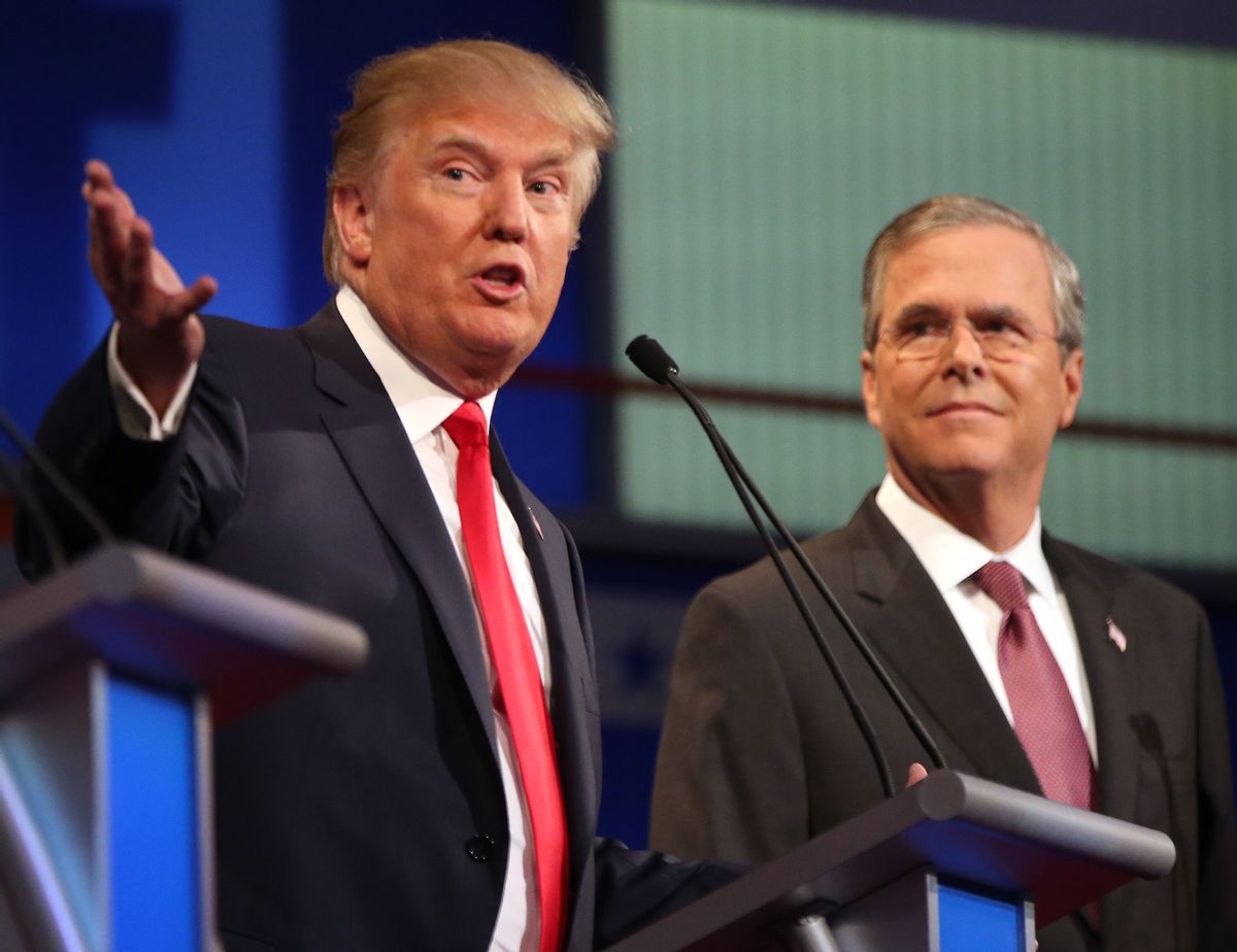 FILE - In this Aug. 6, 2015, file photo, Republican presidential candidates Donald Trump and Jeb Bush participate in the first Republican presidential debate at the Quicken Loans Arena in Cleveland. Presidential debates were big draws and big business for the networks that presented them in 2015 _ at least, when Donald Trump was involved. The first Republican debate was watched by 24 million viewers, the highest-rated broadcast in Fox News Channel's history.  (AP Photo/Andrew Harnik, File) (AP)