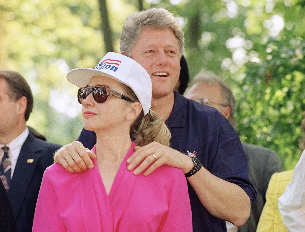 In this July 21, 1992 photo, then-Democratic presidential nominee Bill Clinton stands with Hillary Clinton during a campaign stop at General Butler State Park in Carrollton, Ky.  (AP)