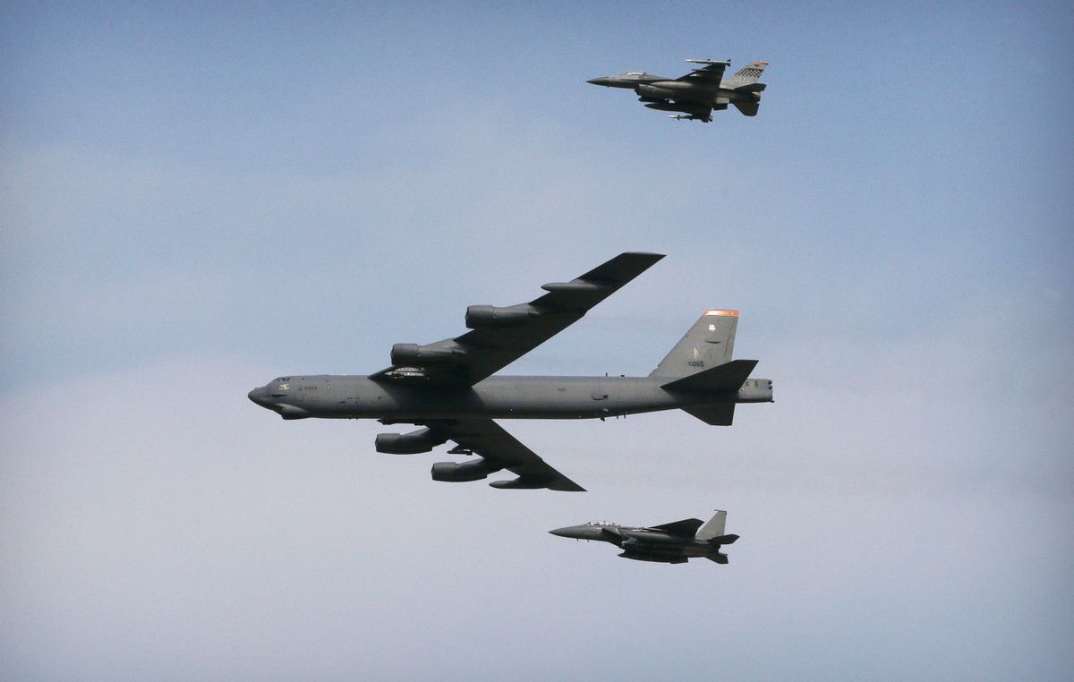 A U.S. Air Force B-52 bomber flies over Osan Air Base in Pyeongtaek, South Korea, Sunday, Jan. 10, 2016. The powerful U.S. B-52 bomber flew low over South Korea on Sunday, a clear show of force from the United States as a Cold War-style standoff deepened between its ally Seoul and North Korea following Pyongyang's fourth nuclear test. (AP Photo/Ahn Young-joon) (AP)