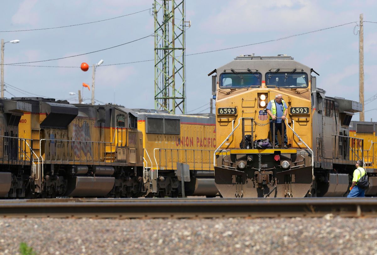 In this Friday, June 6, 2014, photo, Union Pacific locomotives are seen in Council Bluffs, Iowa. Union Pacific reports quarterly earnings, Thursday, Jan. 21, 2016. (AP Photo/Nati Harnik) (AP)