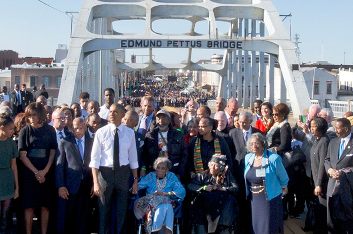 Barack Obama leads a symbolic walk across the Edmund Pettus Bridge, March 7, 2015, in Selma, Ala.   (AP/Jacquelyn Martin)