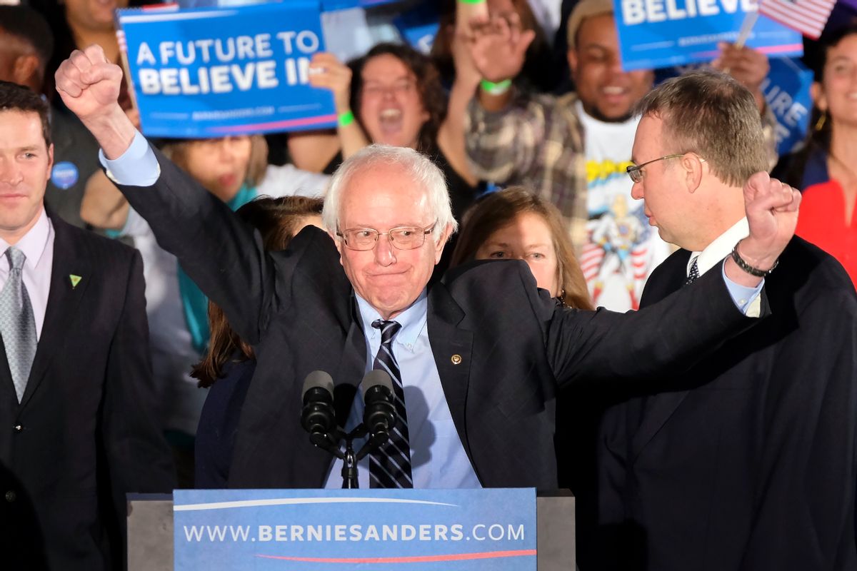 Democratic presidential candidate, Sen. Bernie Sanders, I-Vt., reacts to the cheering crowd at his primary night rally Tuesday, Feb. 9, 2016, in Manchester, N.H. (AP Photo/J. David Ake) (AP)