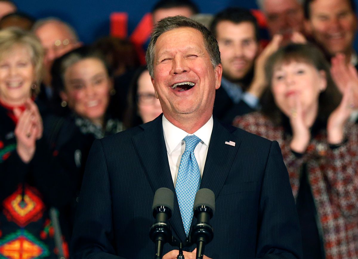 Republican presidential candidate Ohio Gov. John Kasich laughs as he speaks to supporters Tuesday, Feb. 9, 2016, in Concord, N.H., at his primary night rally, (AP Photo/Jim Cole) (Associated Press)