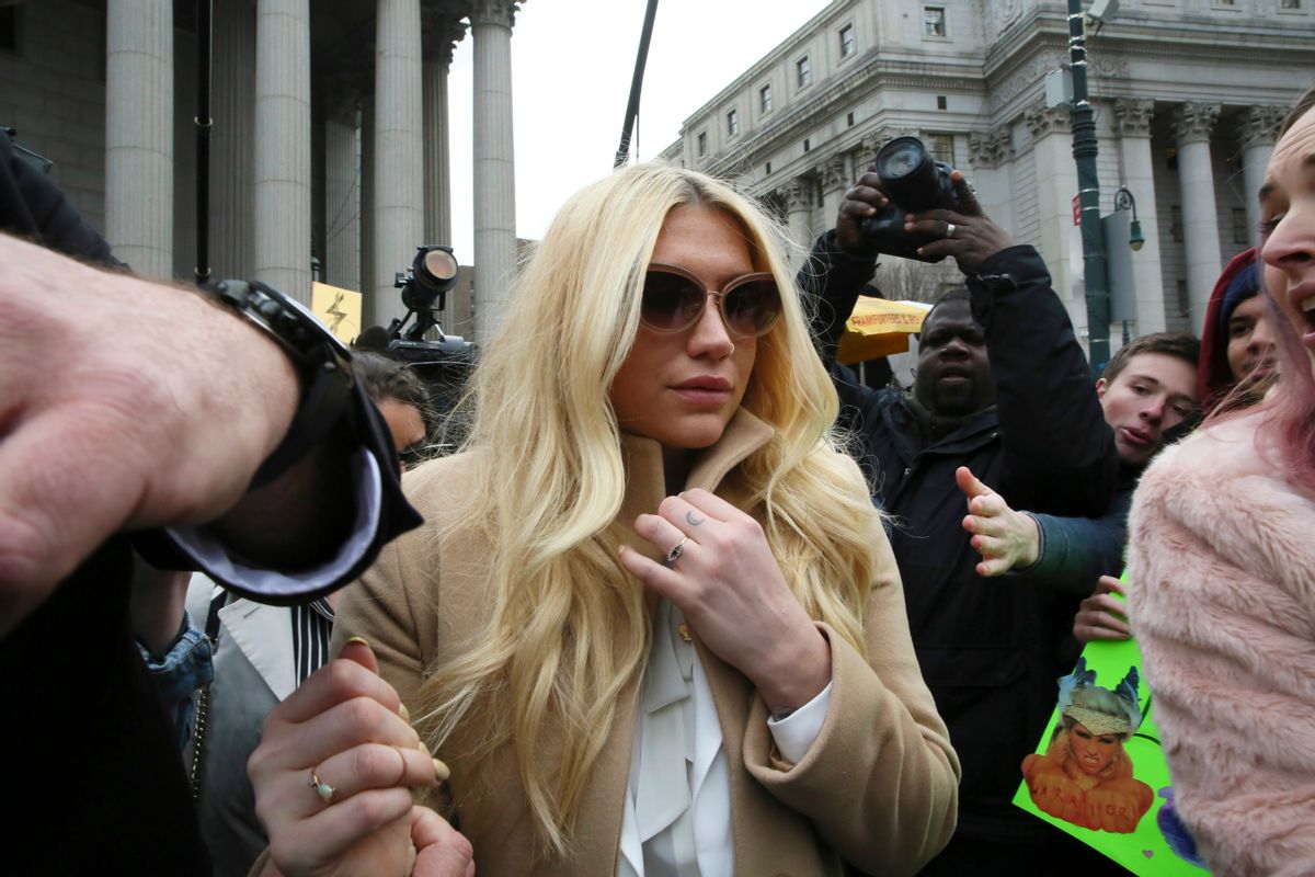 Pop star Kesha leaves Supreme court in New York, Friday, Feb. 19, 2016. Kesha is fighting to wrest her career away from a hitmaker she says drugged, sexually abused and psychologically tormented her _ and still has exclusive rights to make records with her. Producer Dr. Luke says the singer is slinging falsehoods and ruining his reputation to try to weasel out of her recording contract and strike a new deal.   ((AP Photo/Mary Altaffer))