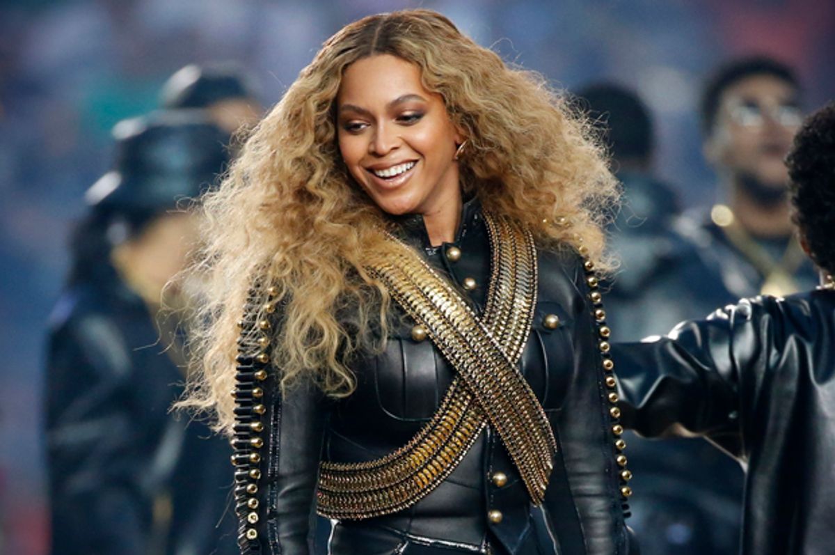 Beyoncé smiles after performing during the half-time show at the Super Bowl, February 7, 2016.    (Reuters/Lucy Nicholson)