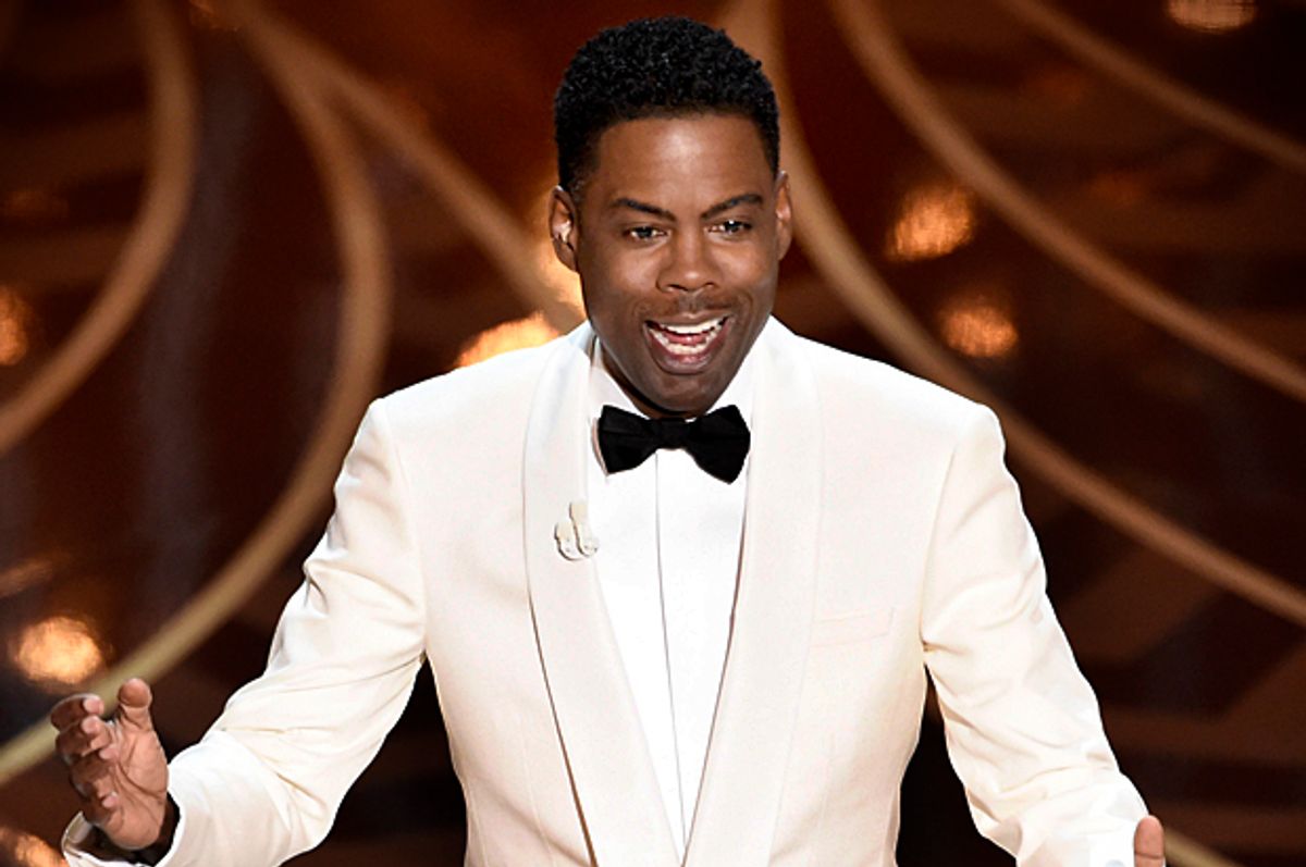Chris Rock hosts the Oscars, Feb. 28, 2016, at the Dolby Theatre in Los Angeles.    (AP/Chris Pizzello)