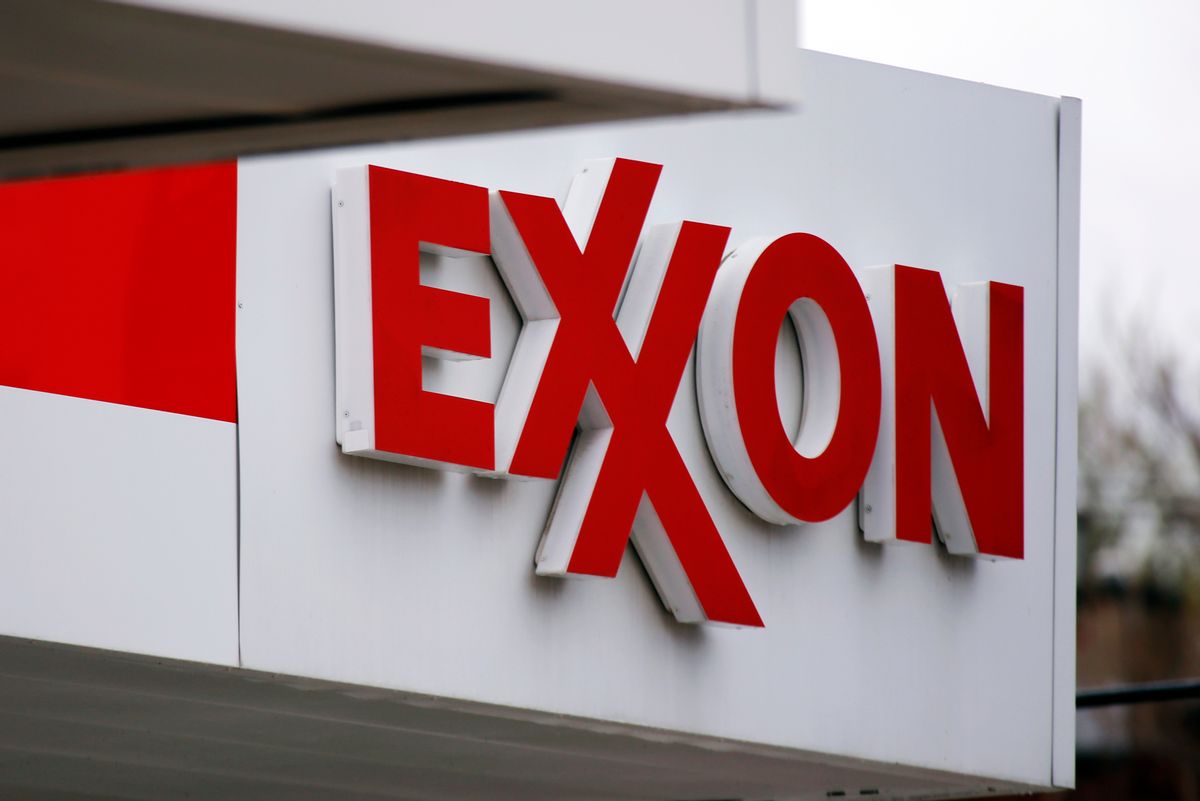 FILE - This April 29, 2014, file photo, shows an Exxon sign at a Exxon gas station in Carnegie, Pa. Exxon Mobil Corp. reports quarterly financial results on Tuesday, Feb. 2, 2016. (AP Photo/Gene J. Puskar, File) (AP Photo/Gene J. Puskar, File)