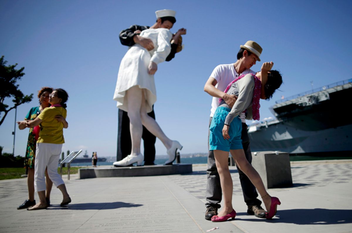 "Unconditional Surrender," a sculpture by Seward Johnson inspired by Alfred Eisenstaedt's iconic photo of a sailor kissing a nurse in Times Square on V-J Day.   (AP/Gregory Bull)