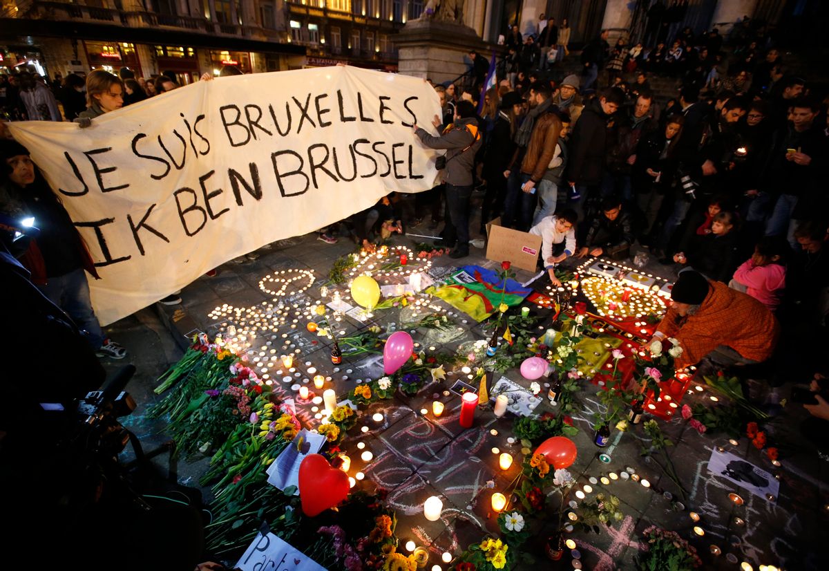 People display a solidarity banner in Brussels following bomb attacks in Brussels, Belgium, March 22, 2016.  Banner reads "I am Brussels" in French and in Flemish languages.  REUTERS/Charles Platiau - RTSBS6P (Reuters)