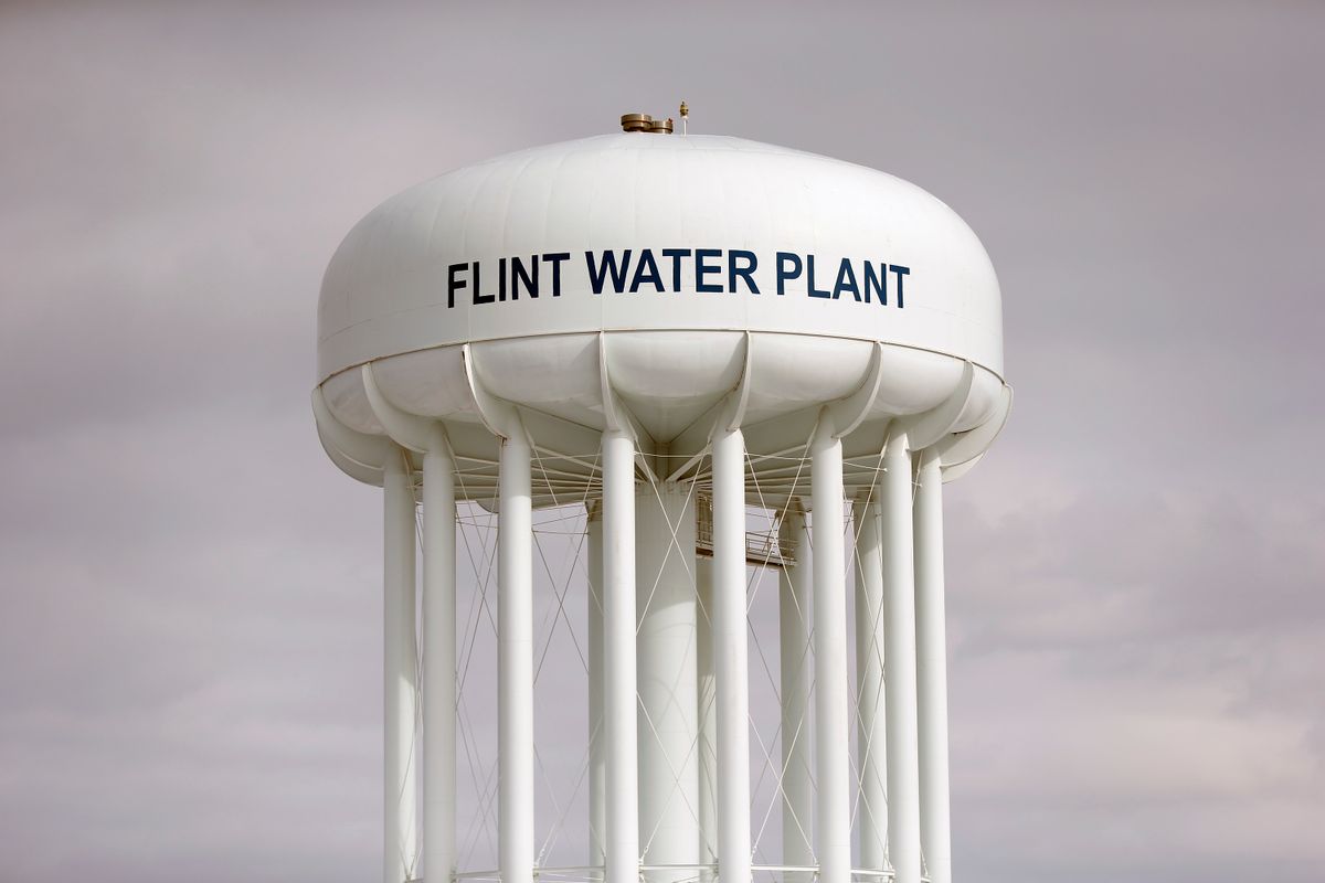 In this Feb. 26, 2016, photo, the Flint Water Plant tower is seen in Flint, Mich. The state-appointed emergency manager who oversaw Flint, Michigan when its water source was switched to the Flint River says he was grossly misled by state and federal experts who never told him that lead was leaching into the citys water supply. Darnell Earley says in prepared testimony for a House hearing March 15 that he was overwhelmed by challenges facing the impoverished city and relied on experts from the Michigan Department of Environmental Quality and U.S. Environmental Protection Agency to advise him.(AP Photo/Paul Sancya) (AP)