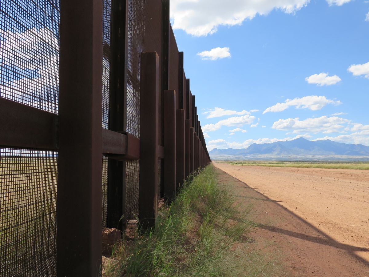 This Wednesday, Sept. 16, 2015 photo shows a part of the border fence near Naco, Ariz., during a tour of the border hosted by the Cochise County Sheriff's Office.  (AP/Astrid Galvan)
